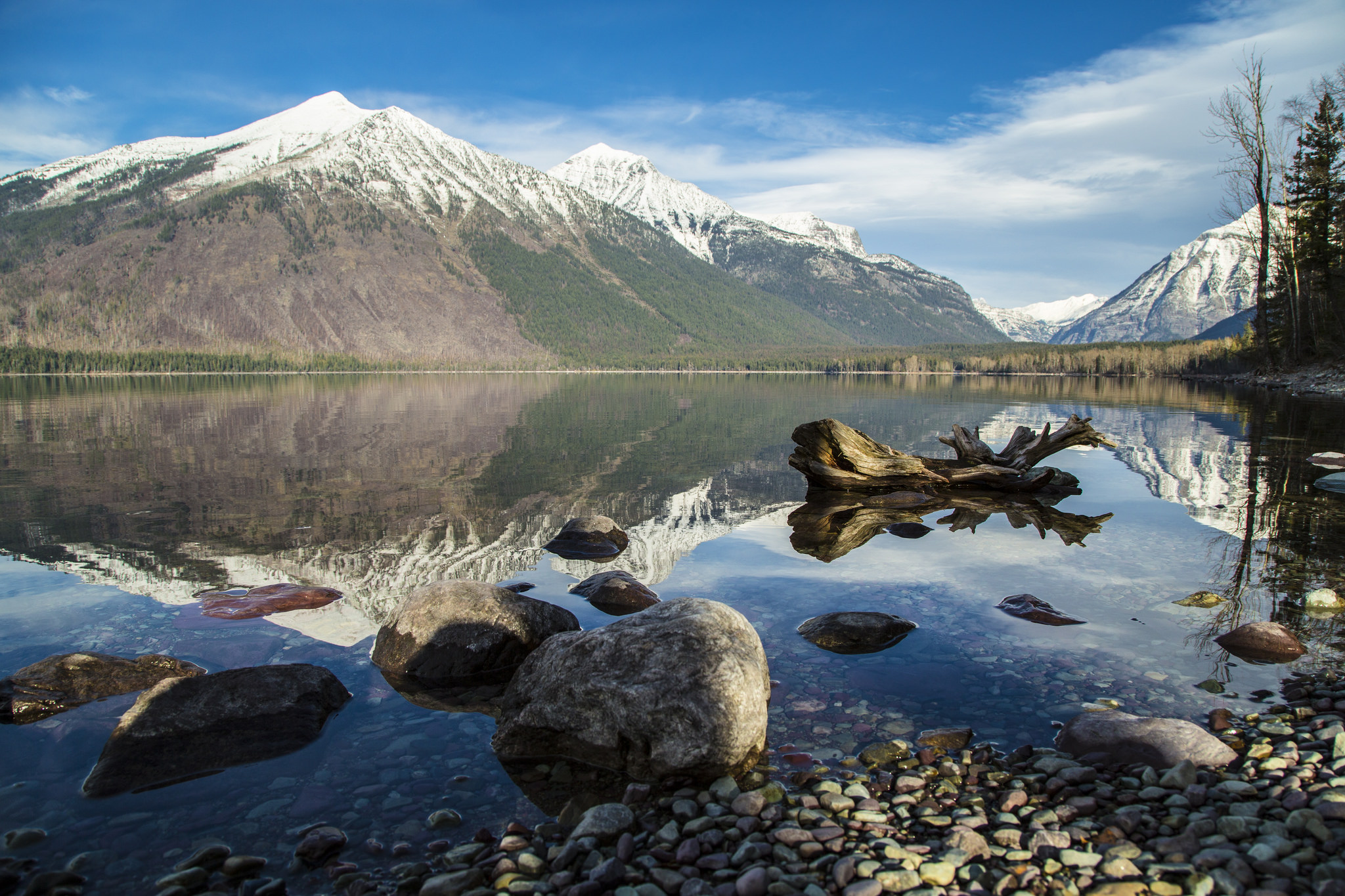 A mountain overlooking a lake in Glacier National
Park